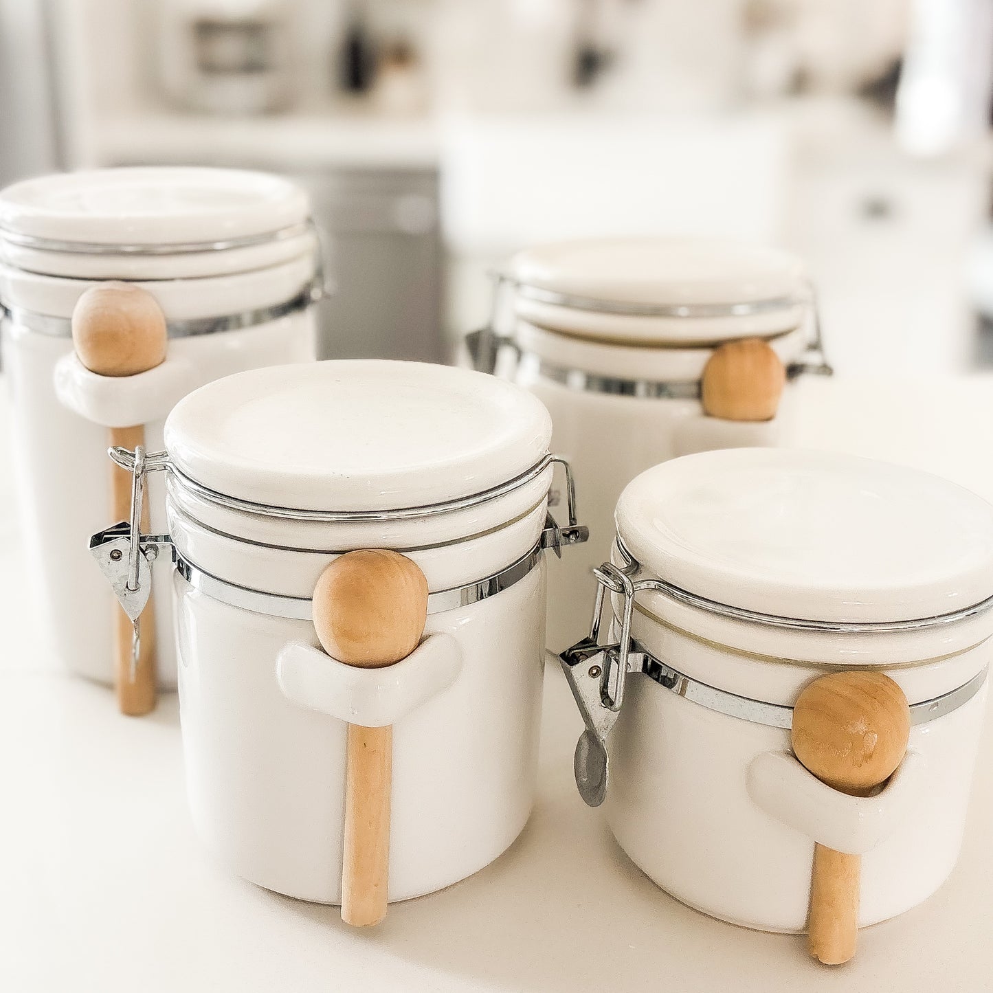 white canister set with wooden spoons - set of 4