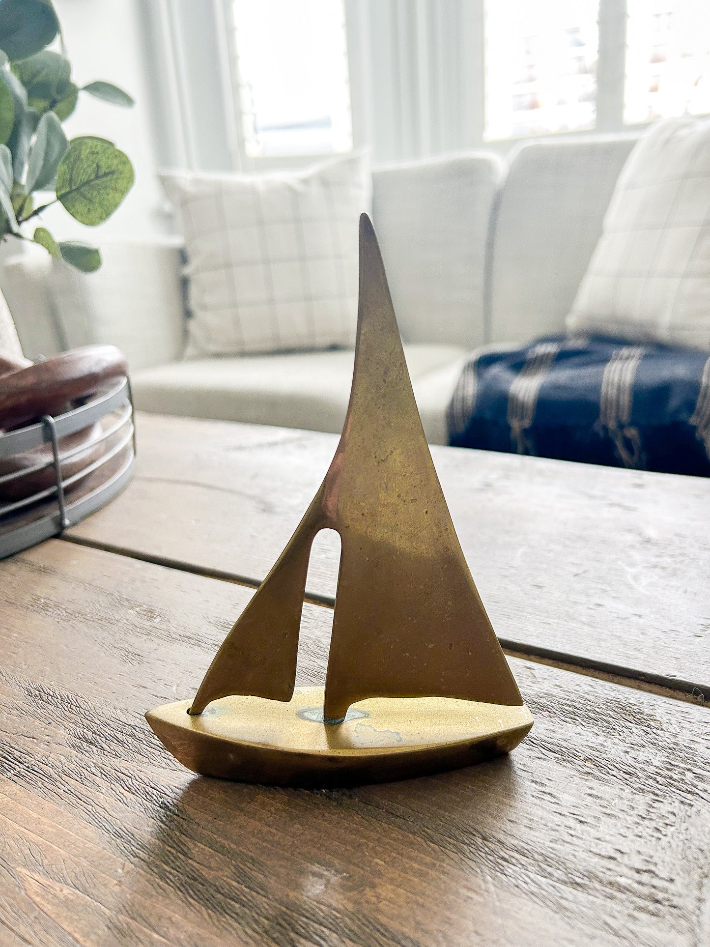 brass sailboat